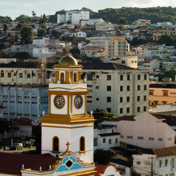 Urban view with a historic church and cityscape in MG, Brazil showcasing architecture and tradition.